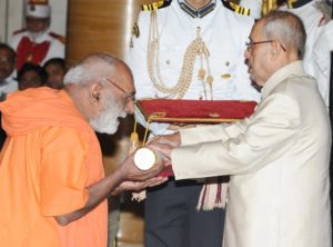 1.Swami Suddhanandaji receiving the award from President